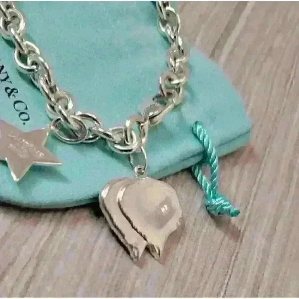 Tiffany & Co Sterling Silver Lancome Charm Bracelet - Picture 4 of 8